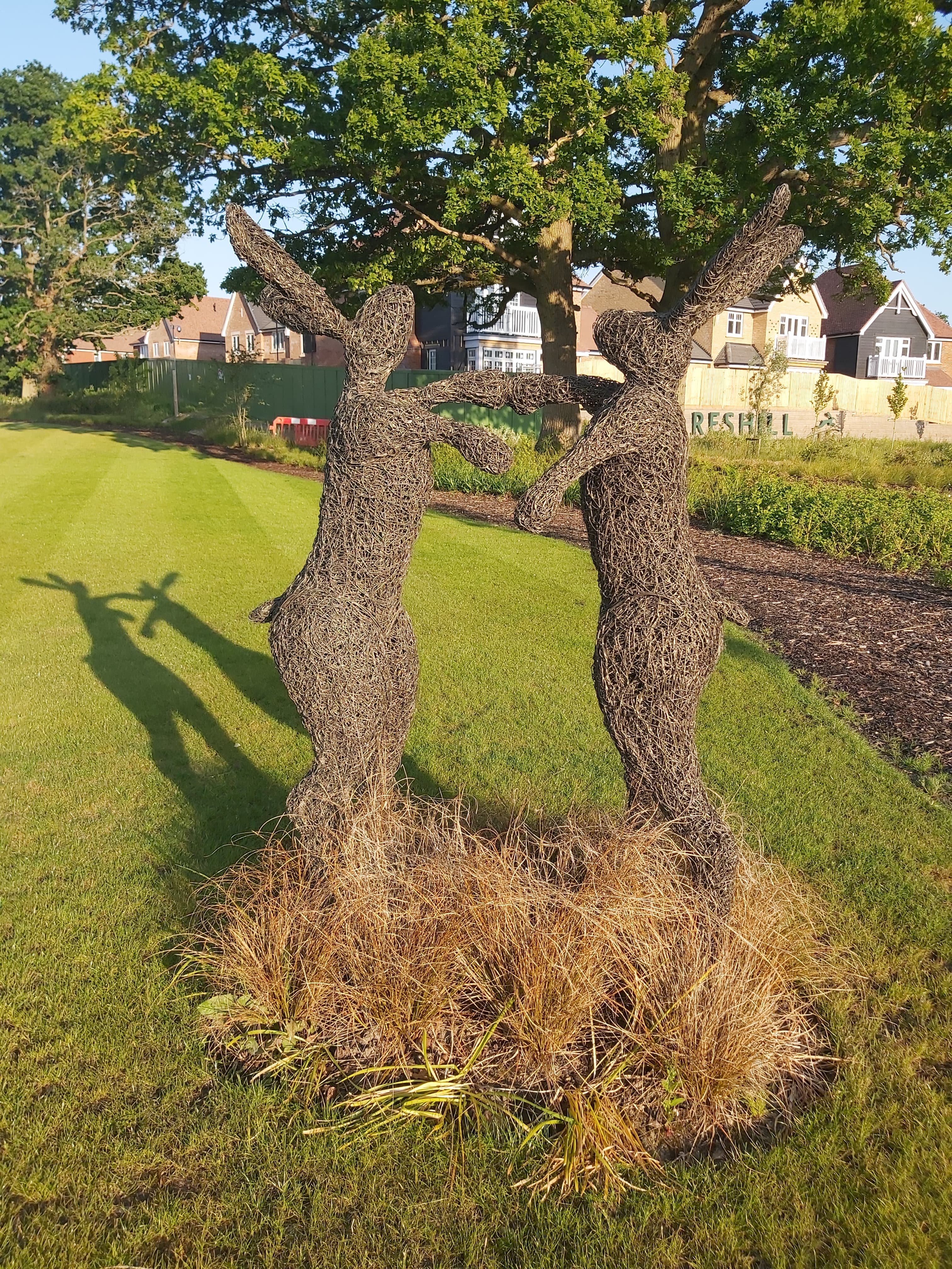 The Dancing Hares, sculpted by Emma Stothard, Crookham Village, United Kingdom