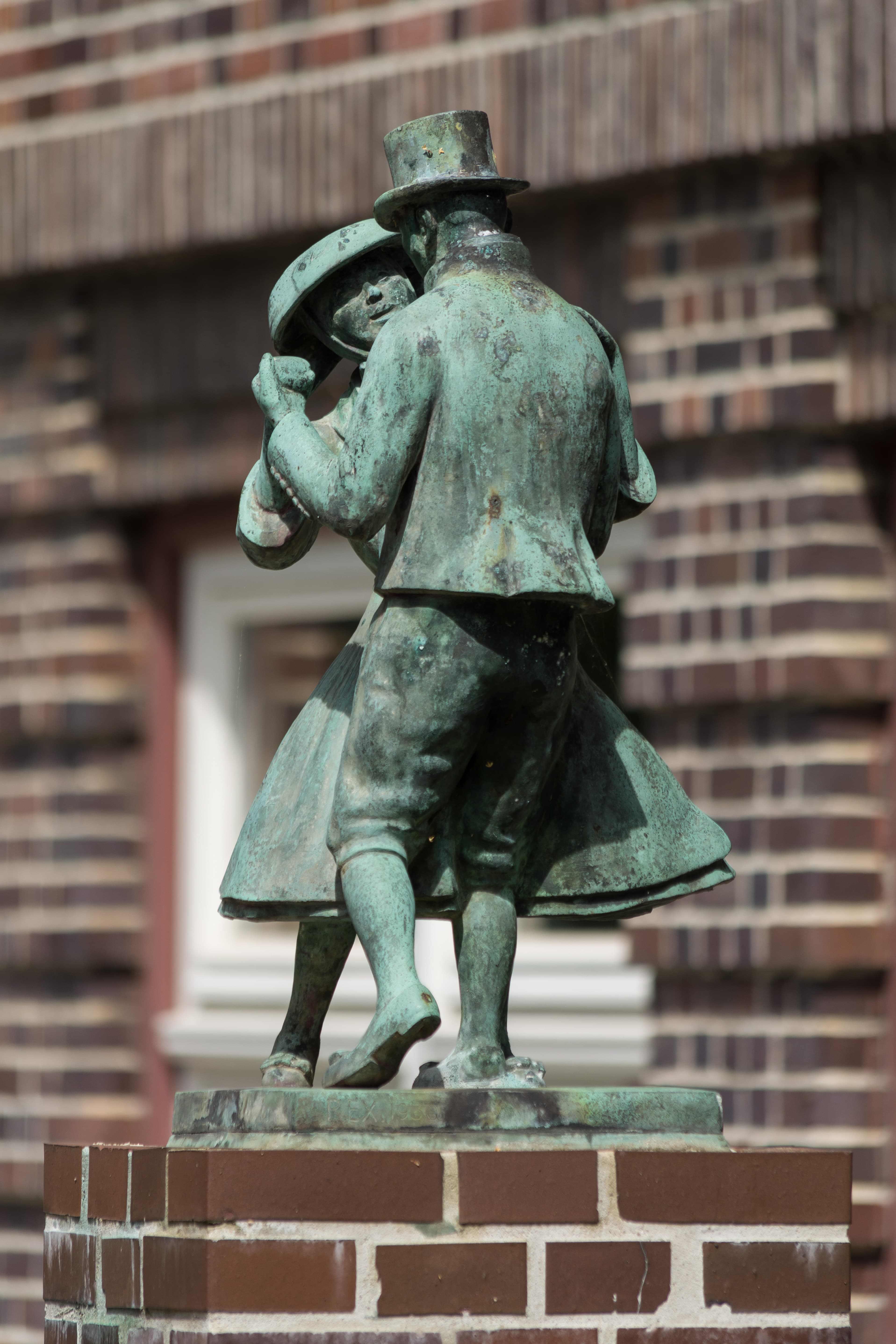 Vierlande couple dancing, sculpted by Wilhelm Rex, Bergedorf, Germany