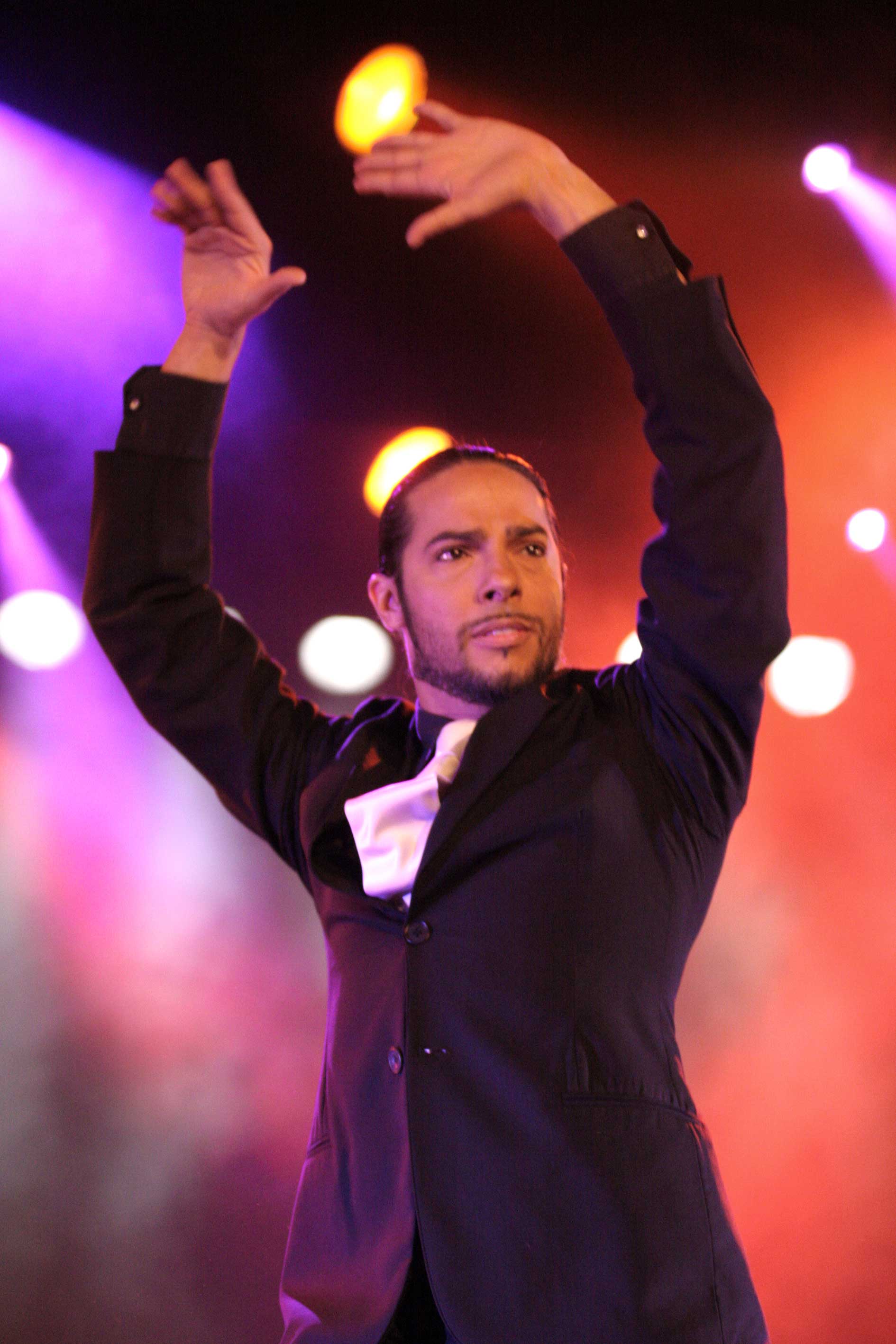 Joaquín Cortés in a black sleeveless costume during a 2005 performance