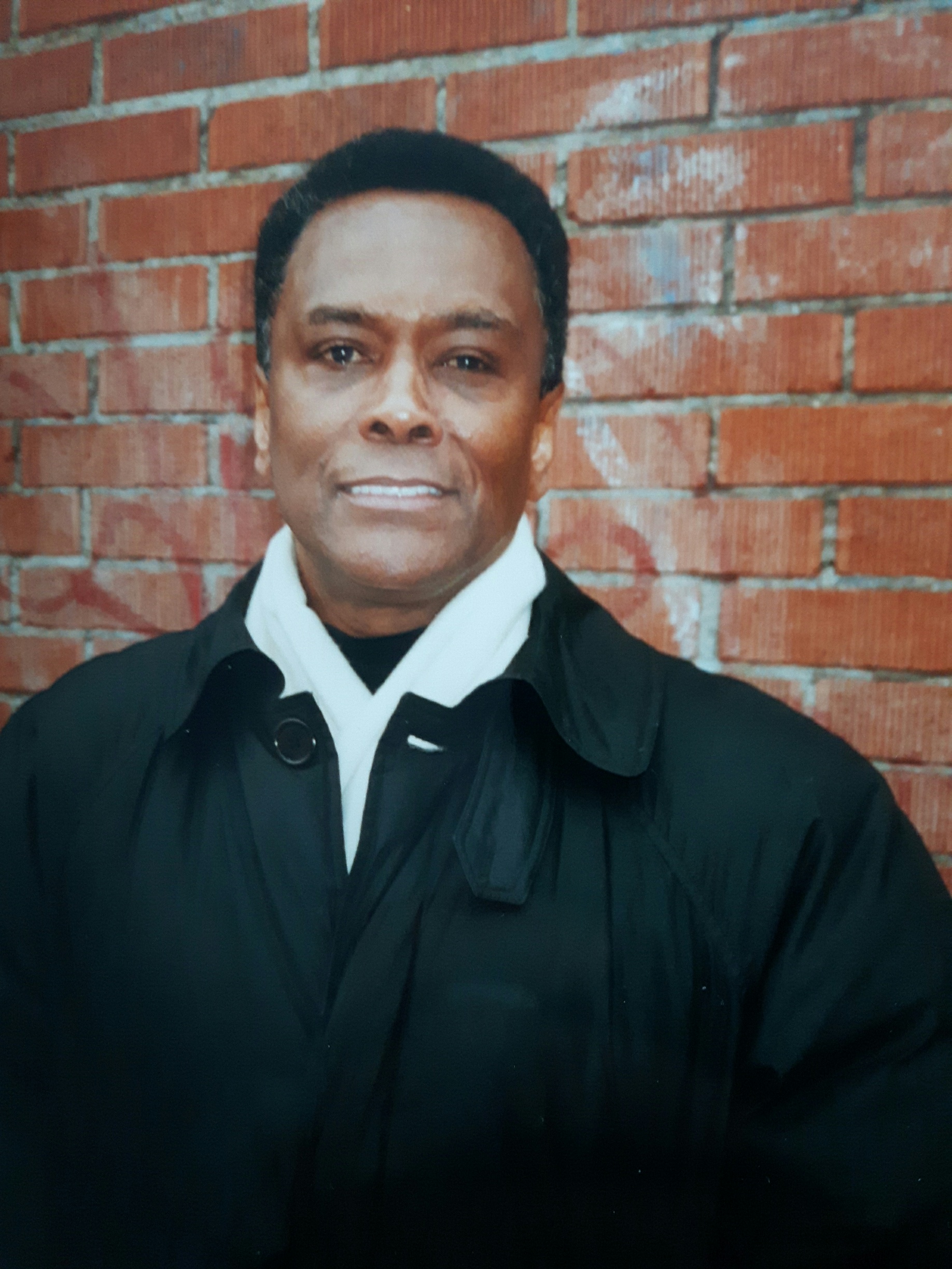 Color portrait of Arthur Mitchell smiling in New York in 1998