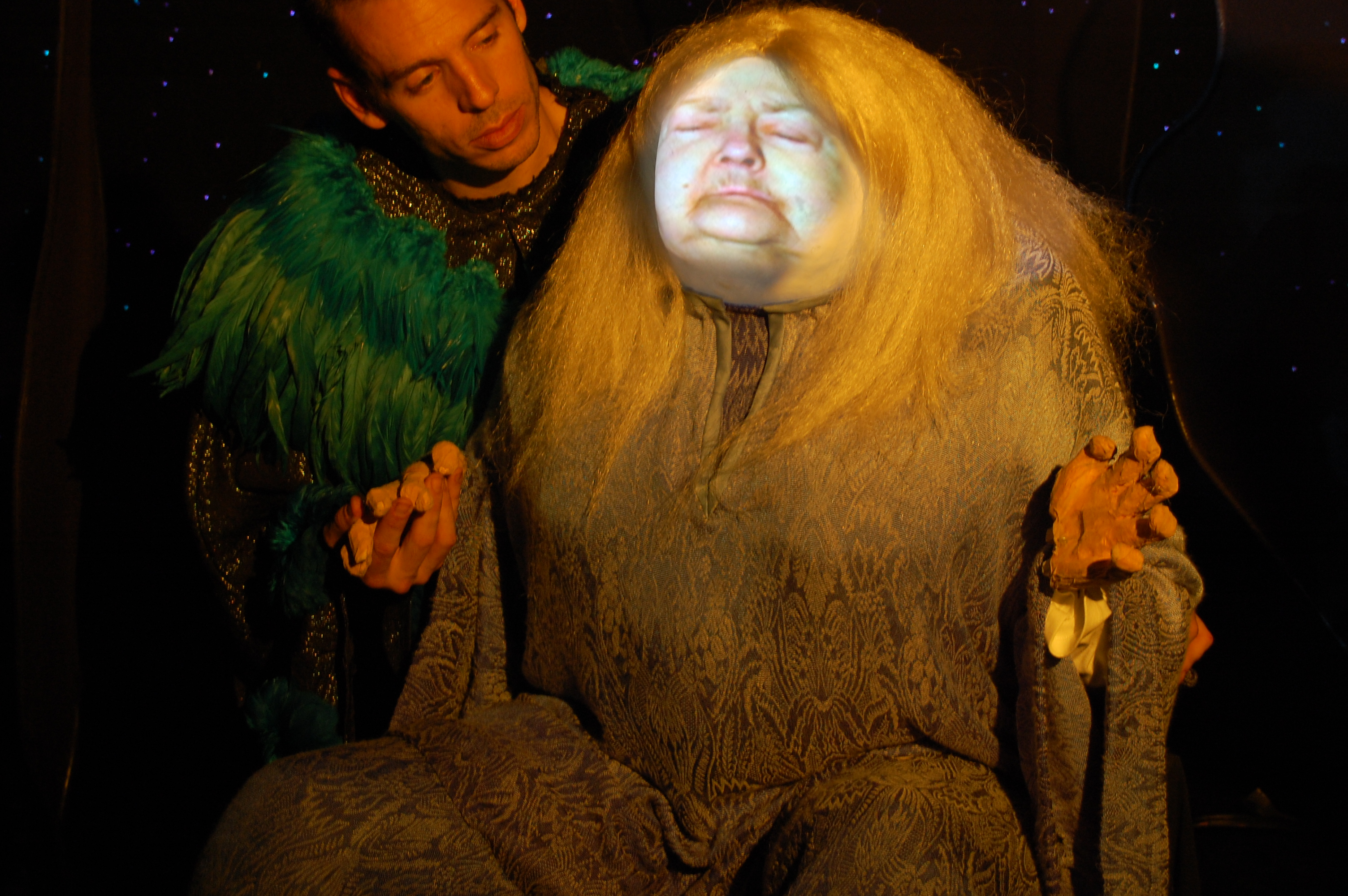 Basil Twist beside a video puppet depicting Lee Nagrin in the production Behind the Lid, 2007