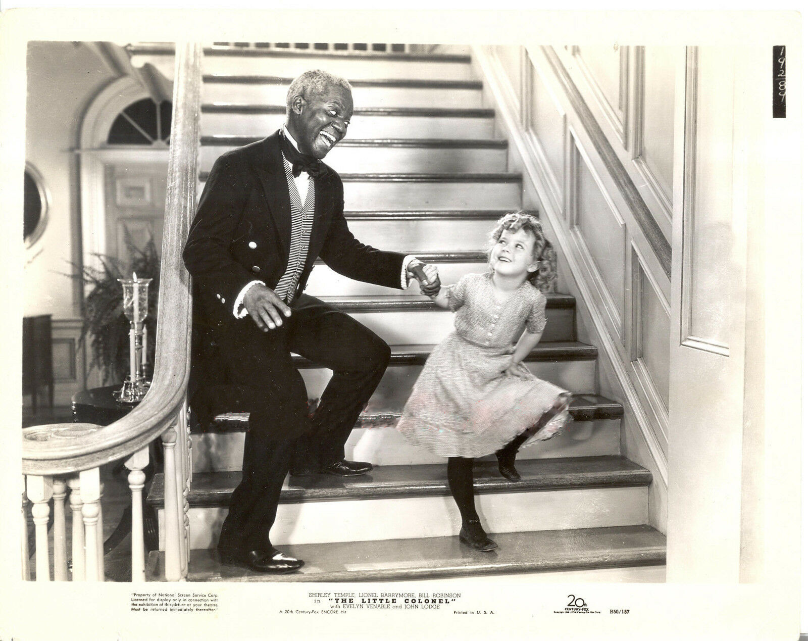 Bill Robinson and Shirley Temple performing a stair dance in The Little Colonel