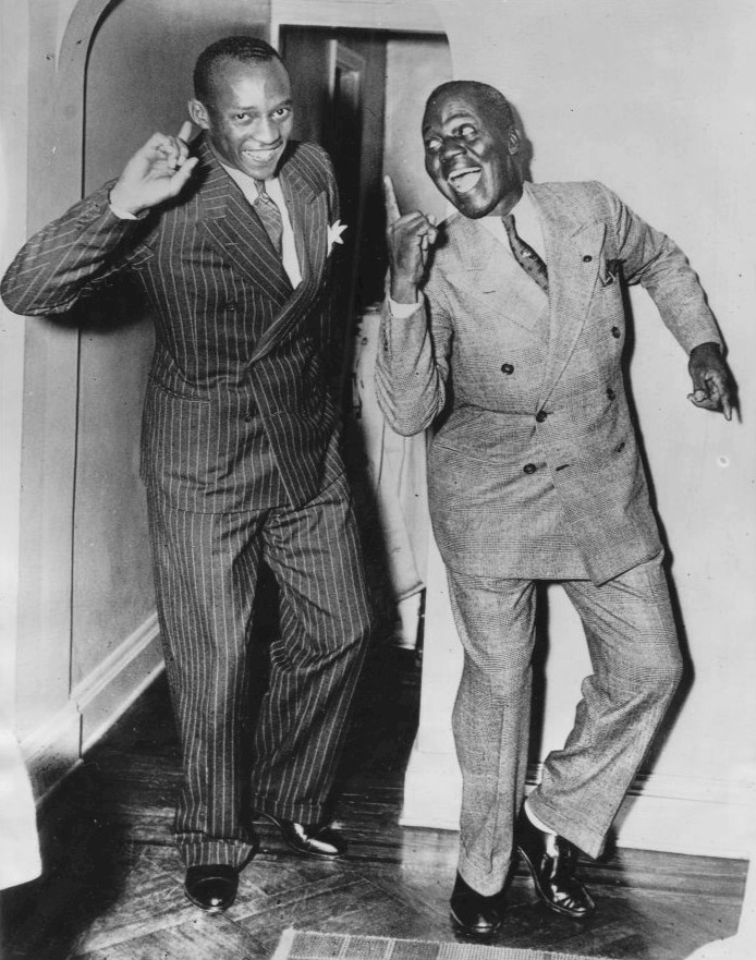 Jesse Owens and Bill Bojangles Robinson together after Owens returned from the 1936 Olympics