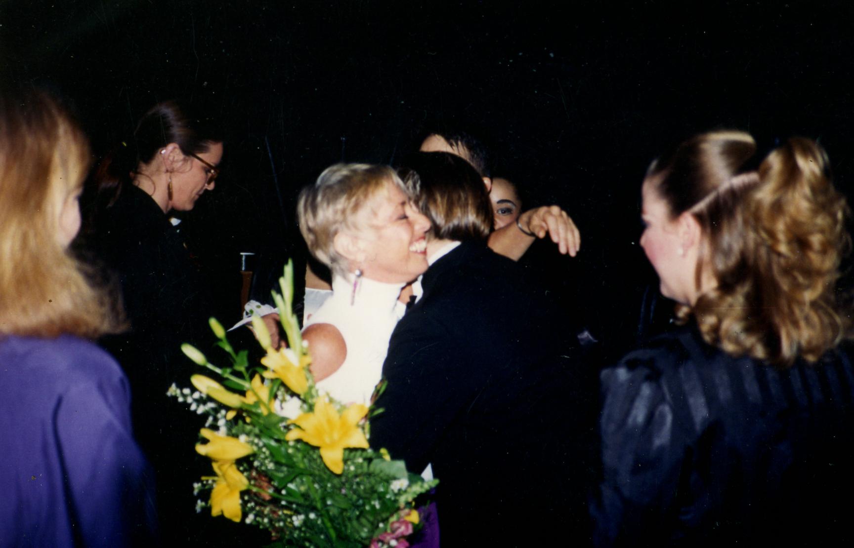 Brenda Bufalino standing with members of The Jefferson Dancers after a 1993 performance