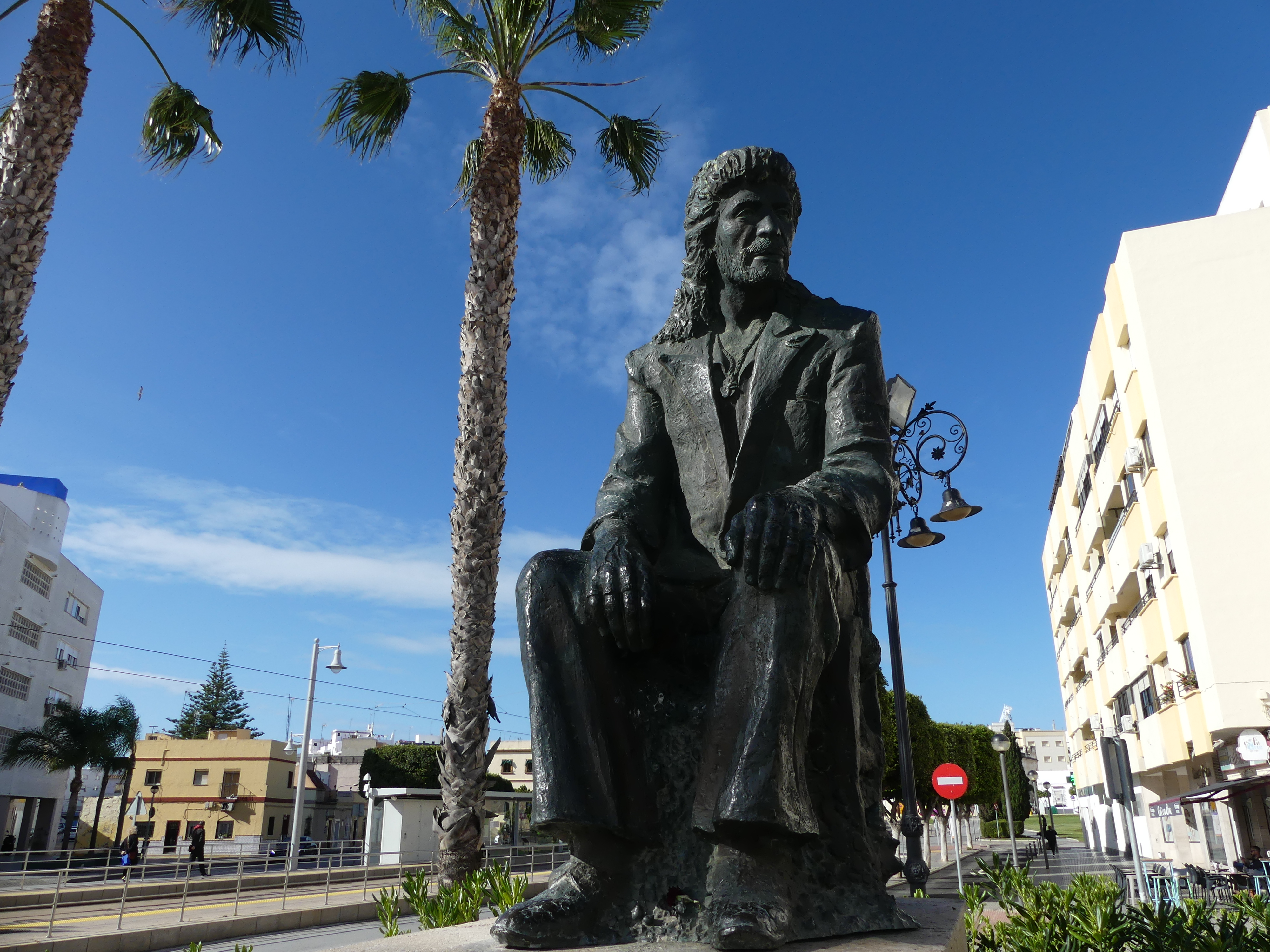 Bronze seated monument to Camarón de la Isla in San Fernando