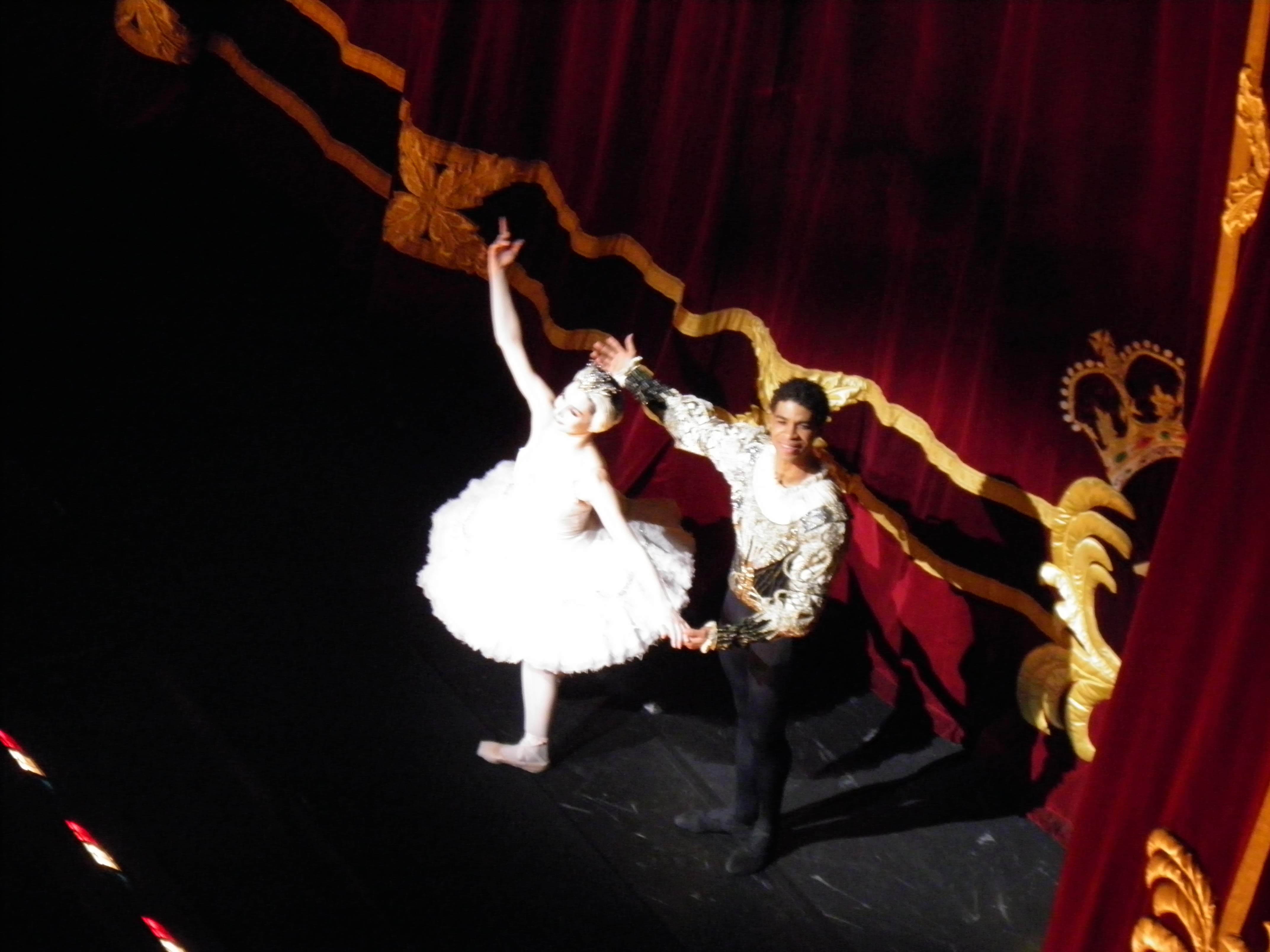 Carlos Acosta and a Royal Ballet ballerina acknowledging applause after Swan Lake in 2011