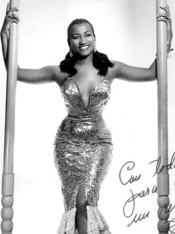 Black-and-white studio portrait of Celia Cruz in 1957
