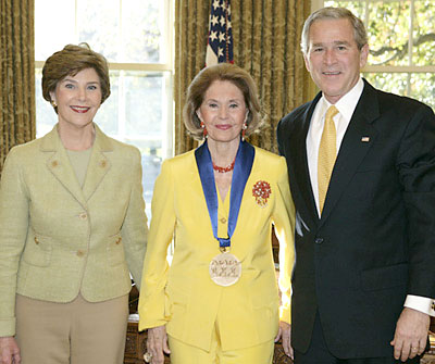 Cyd Charisse receiving the 2006 National Medal of Arts from President George W. Bush and Laura Bush