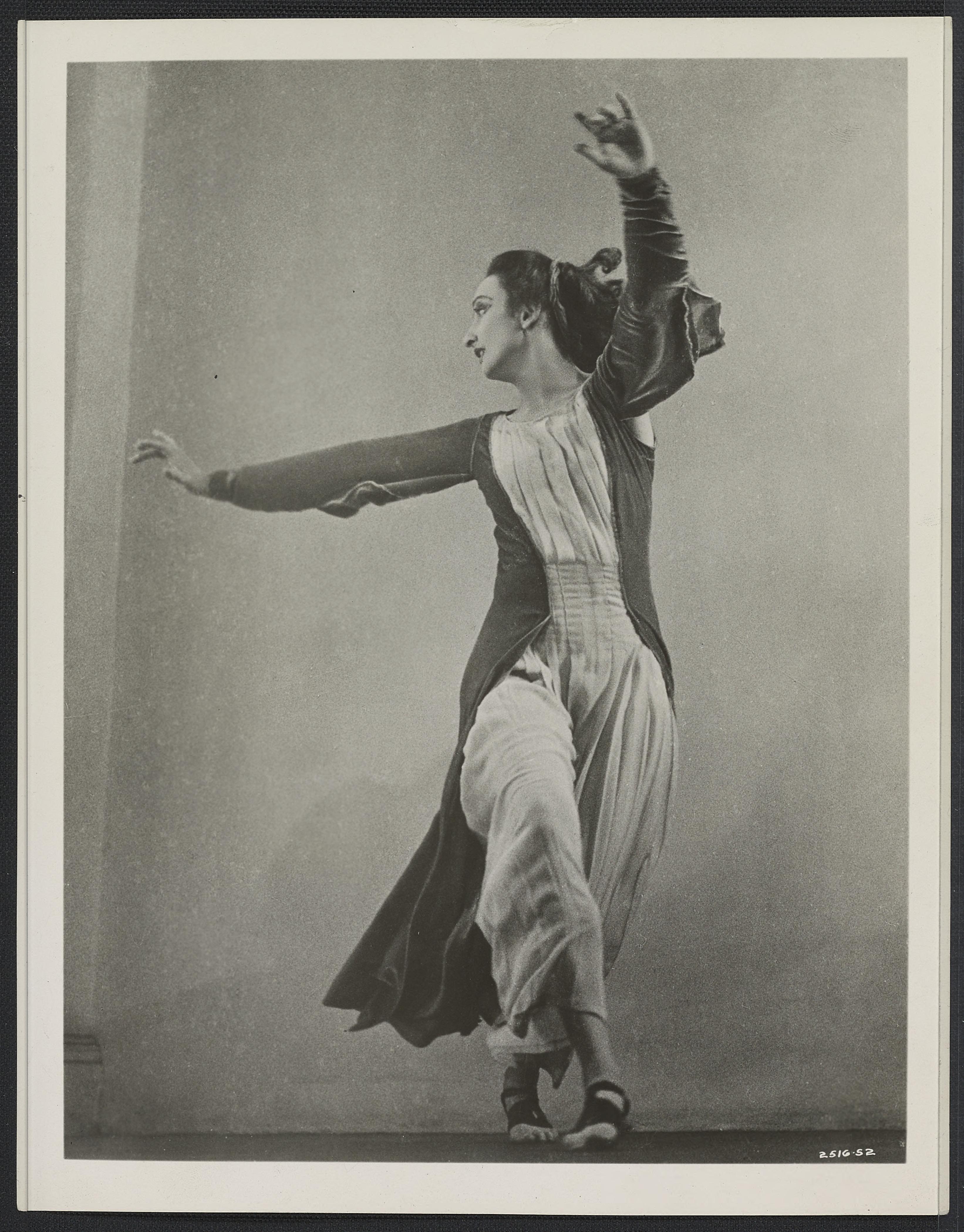 Doris Humphrey as the Matriarch in With My Red Fires, reaching in opposite directions through a strongly angled pose.