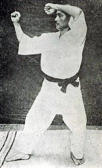 Gichin Funakoshi executing the fourth movement of Heian Nidan kata in 1925