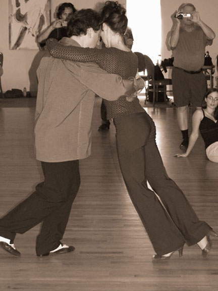 Gustavo Naveira and Giselle Anne demonstrating a volcada during a tango workshop
