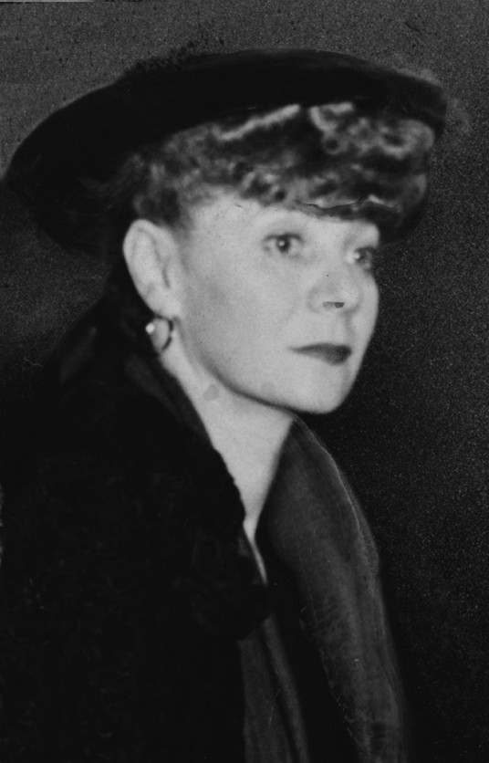 Black-and-white portrait crop of Helen Tamiris watching a Broadway audition in 1948