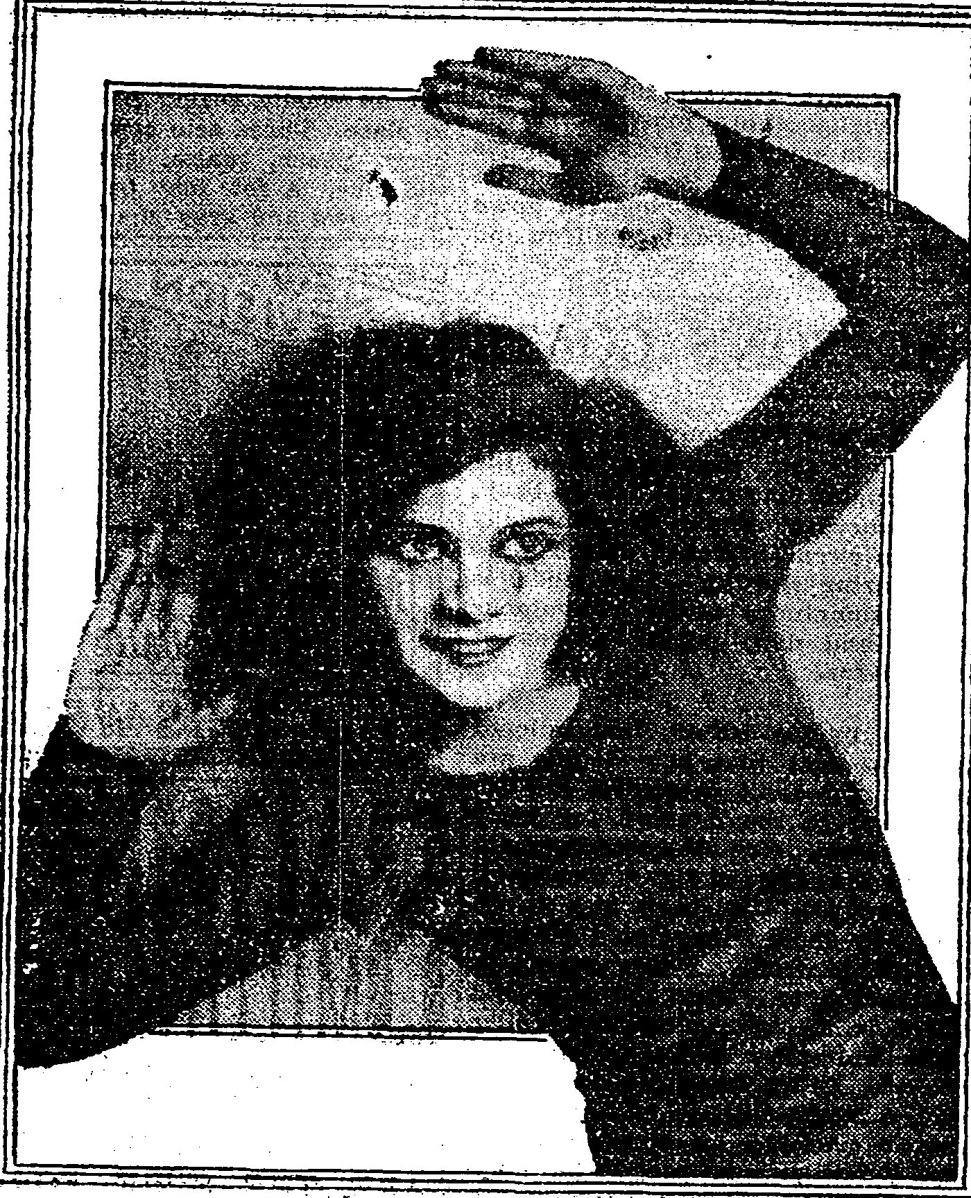 Black-and-white 1929 portrait of Helen Tamiris in a dark costume and head covering