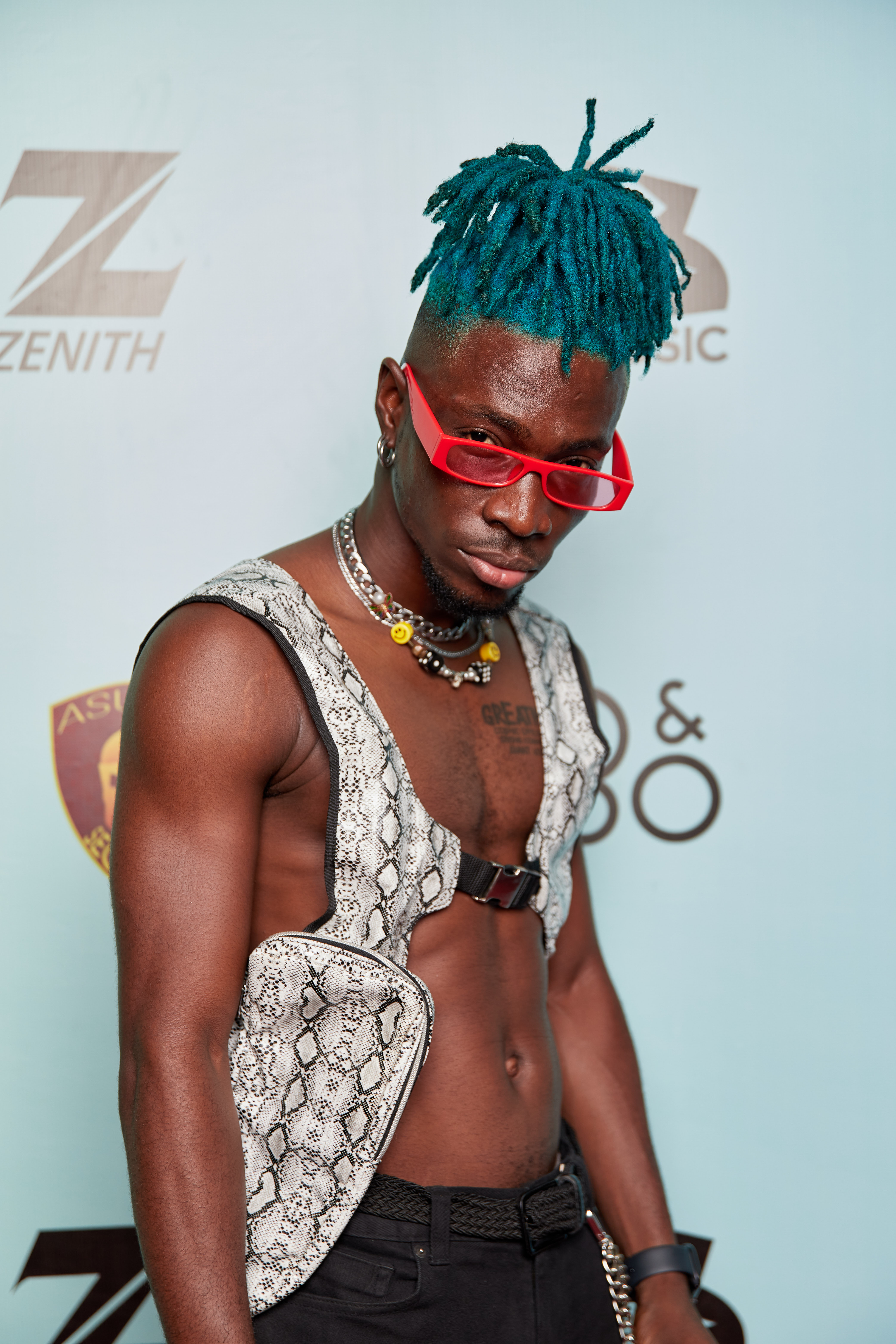 Incredible Zigi standing for a red-carpet portrait at the 3 Music Awards in 2022