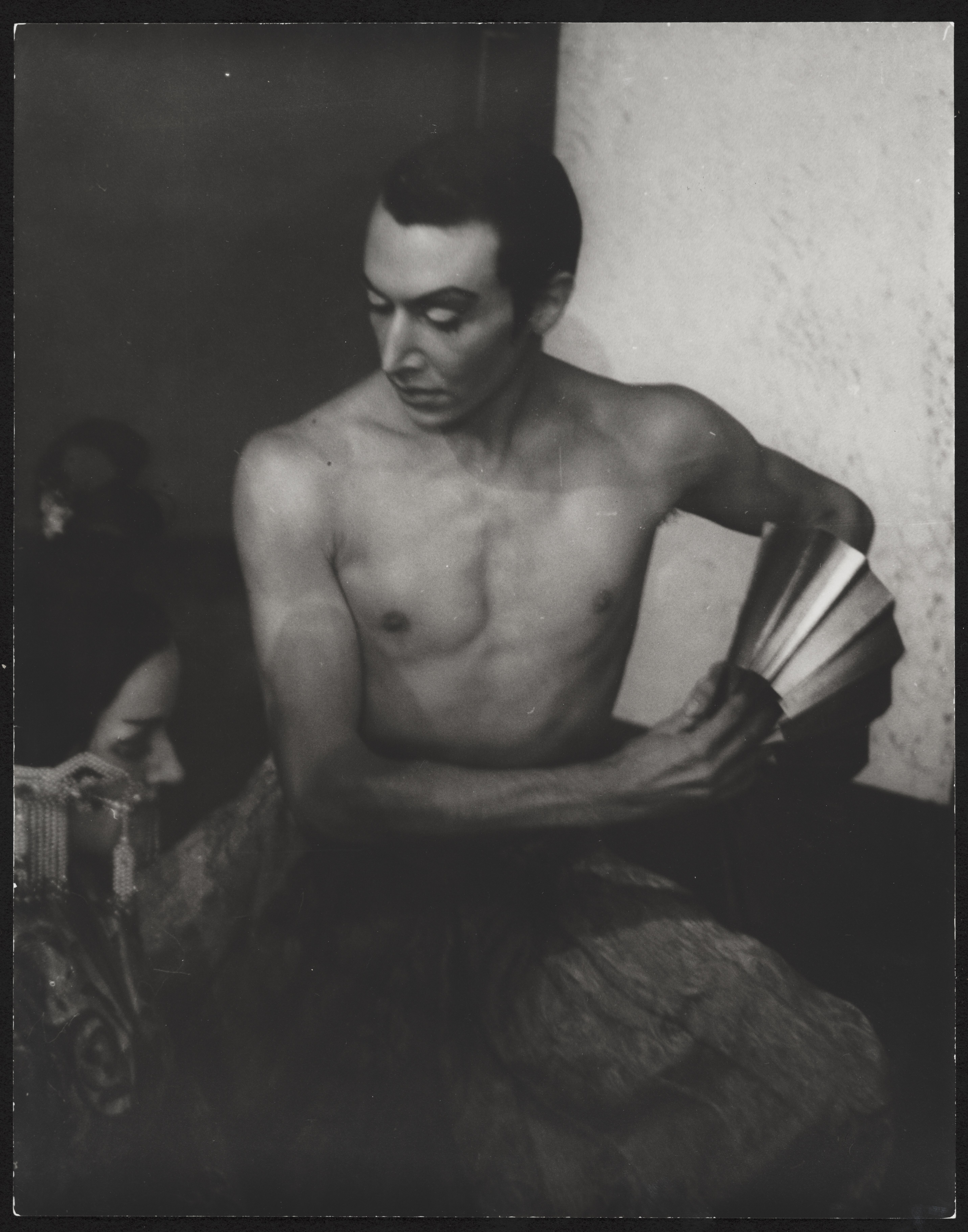 Black-and-white studio portrait of choreographer Jack Cole seated in profile in 1937.