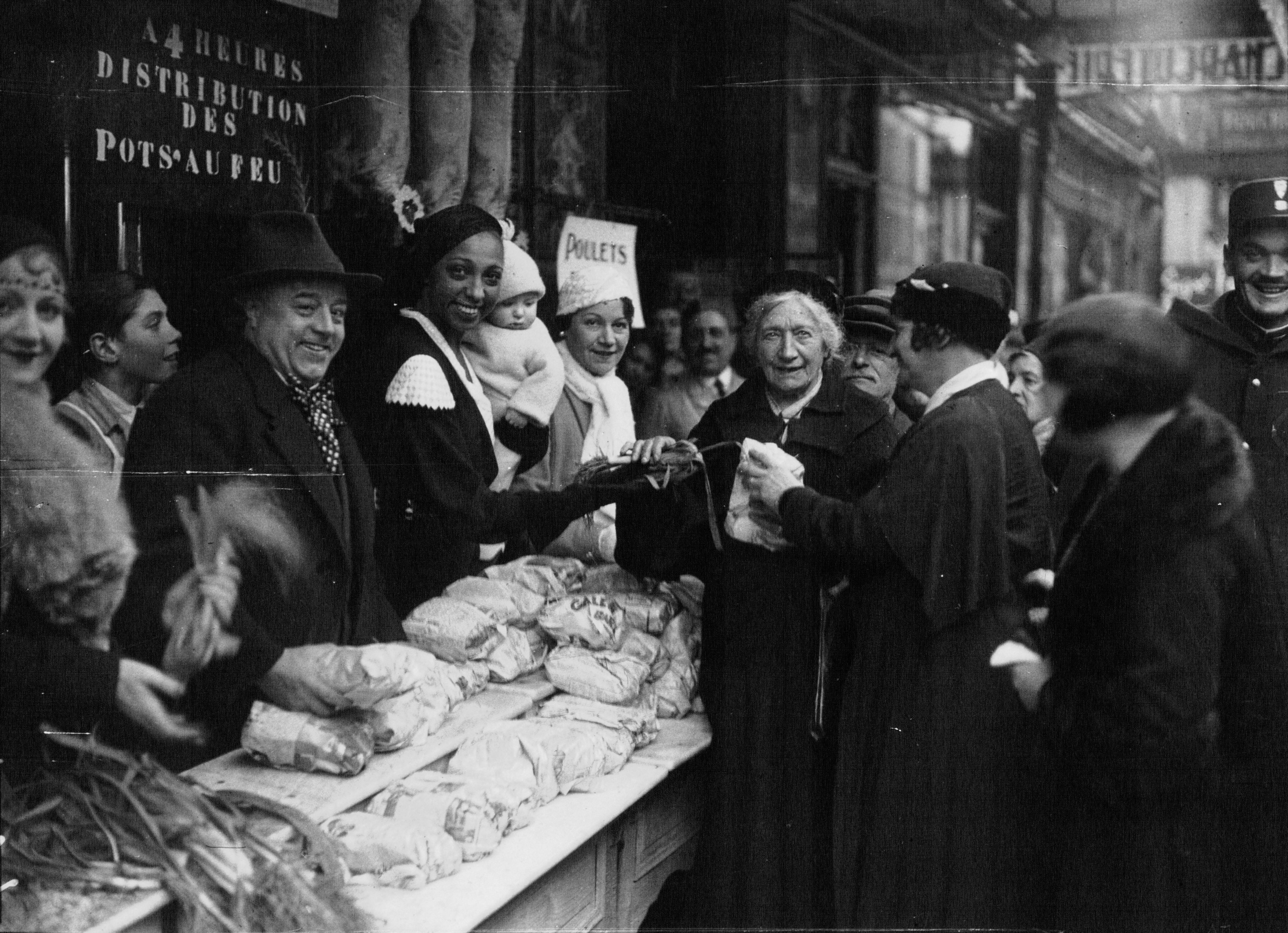 Josephine Baker helping at a charitable food distribution in Paris in 1932