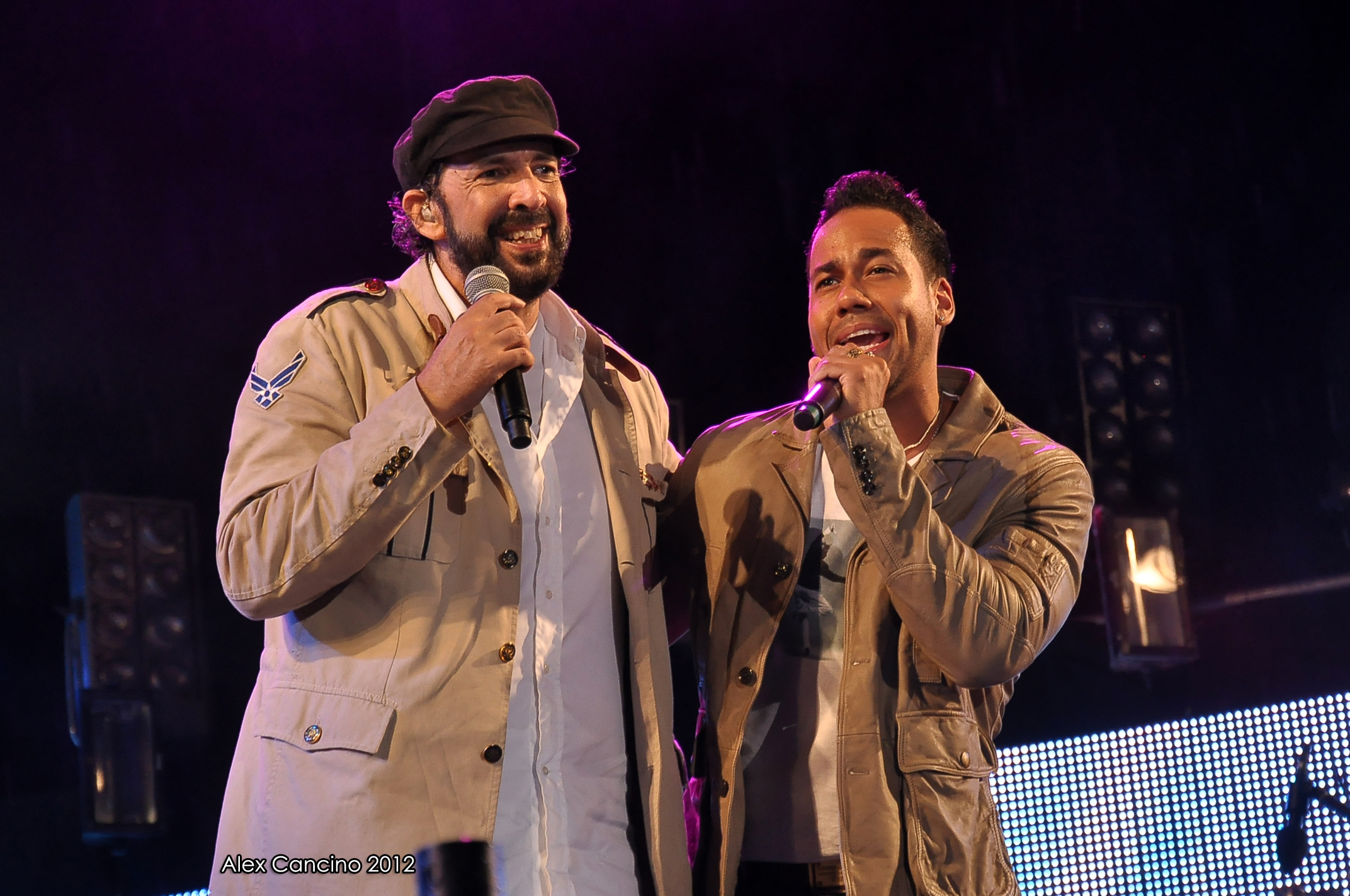 Romeo Santos and Juan Luis Guerra performing together in Santo Domingo in 2012