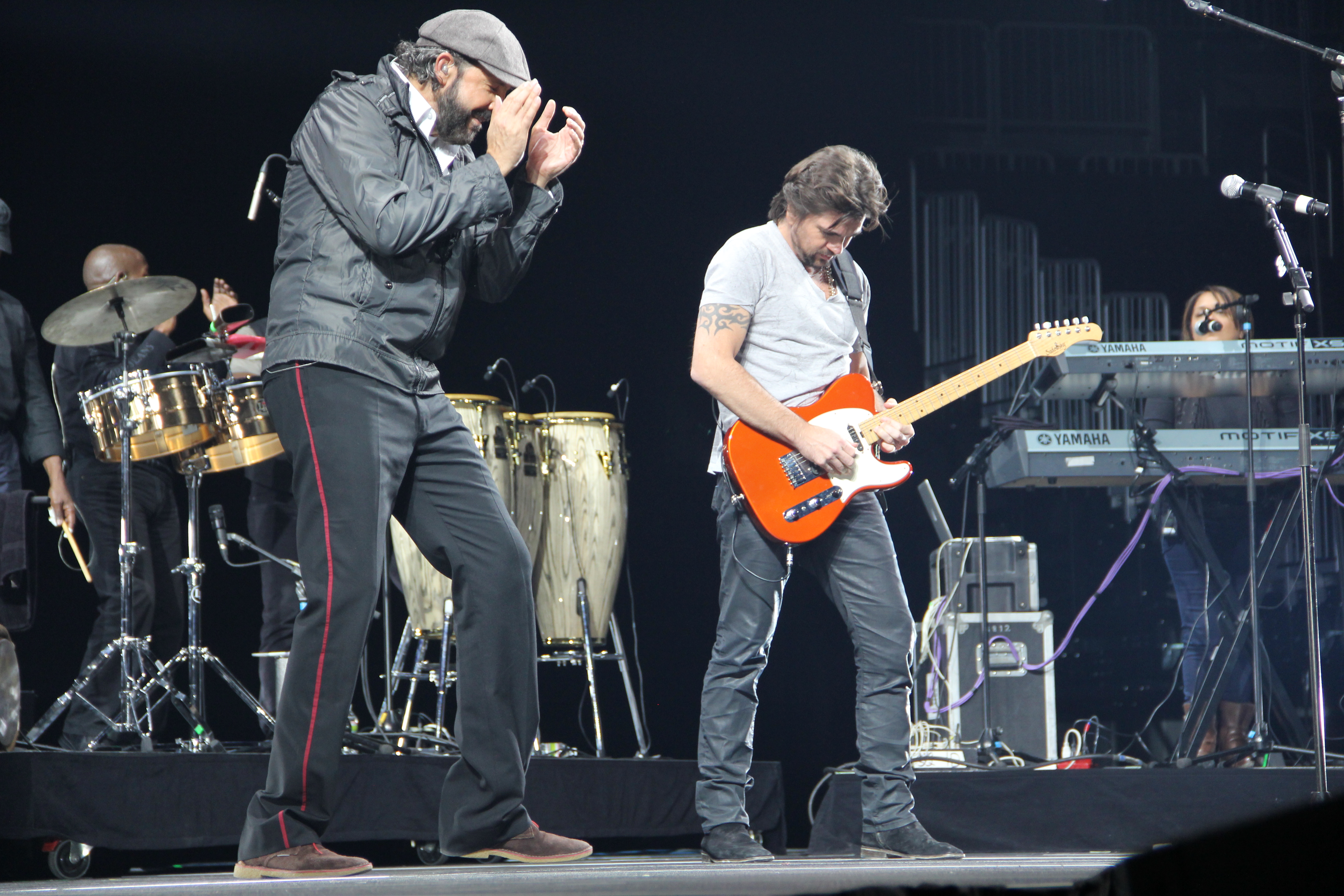 Juanes and Juan Luis Guerra performing at a Hurricane Sandy benefit concert in Brooklyn in 2012