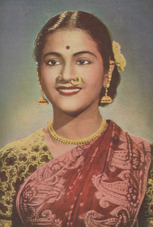 Black-and-white 1951 studio portrait of Bharatanatyam dancer Kumari Kamala wearing a sari and jewelry
