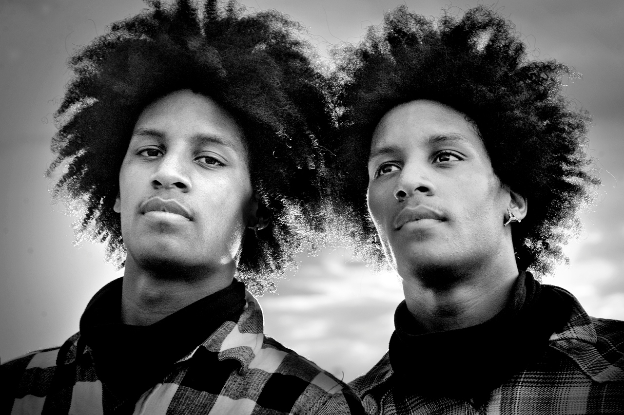 Black-and-white close portrait of Laurent and Larry Bourgeois