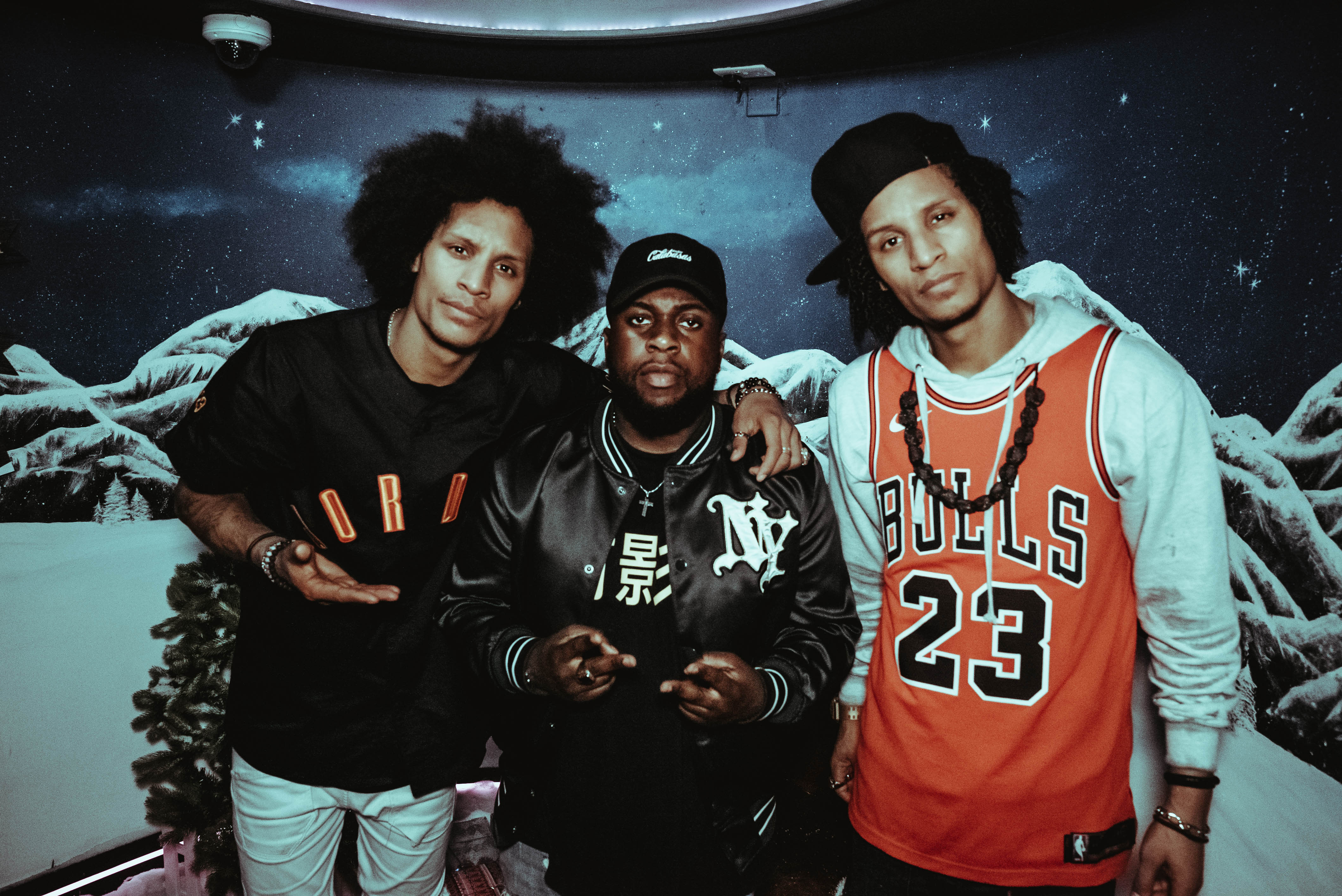 Les Twins posing with photographer and videographer Emmanuel Wendt in 2018