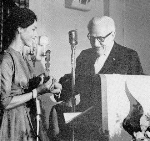 Maria Tallchief receiving a Dance Magazine award from publisher Rudolf Orthwine in 1961