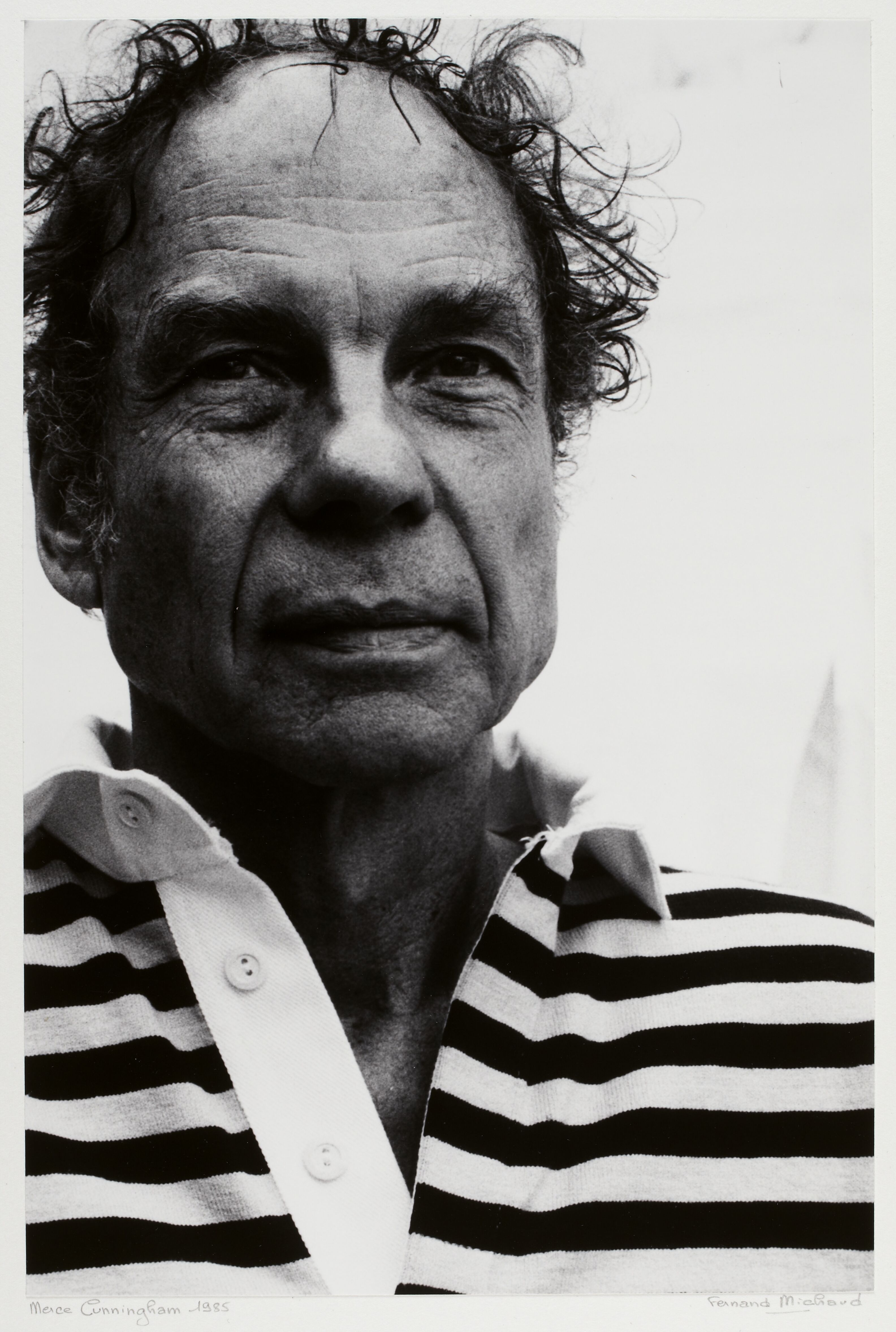 Black-and-white portrait of Merce Cunningham in 1986