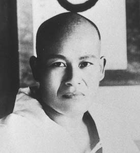 Black-and-white photograph of Morihei Ueshiba at Ayabe in 1921.