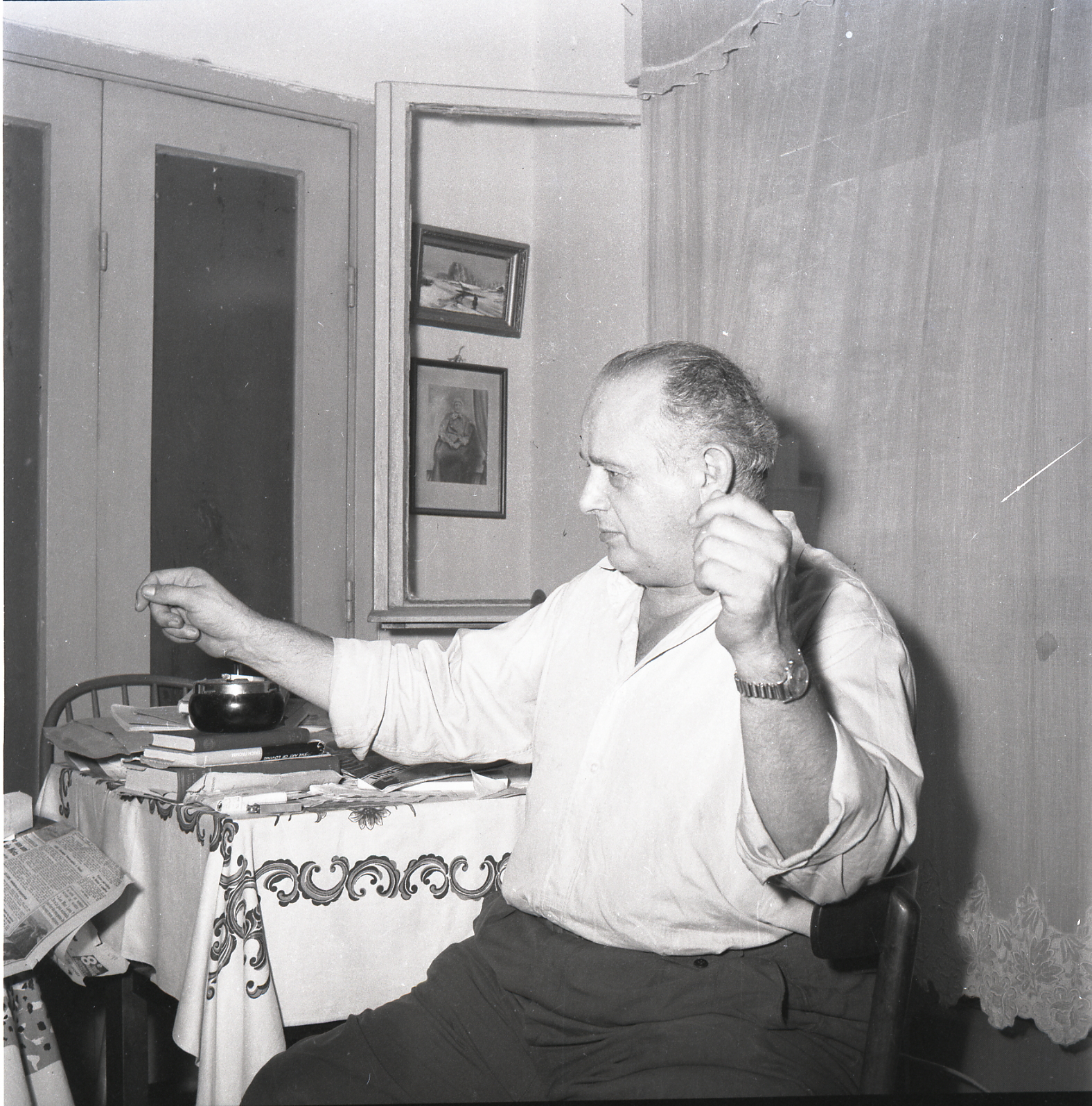 Black-and-white portrait of Moshé Feldenkrais seated and looking toward the camera