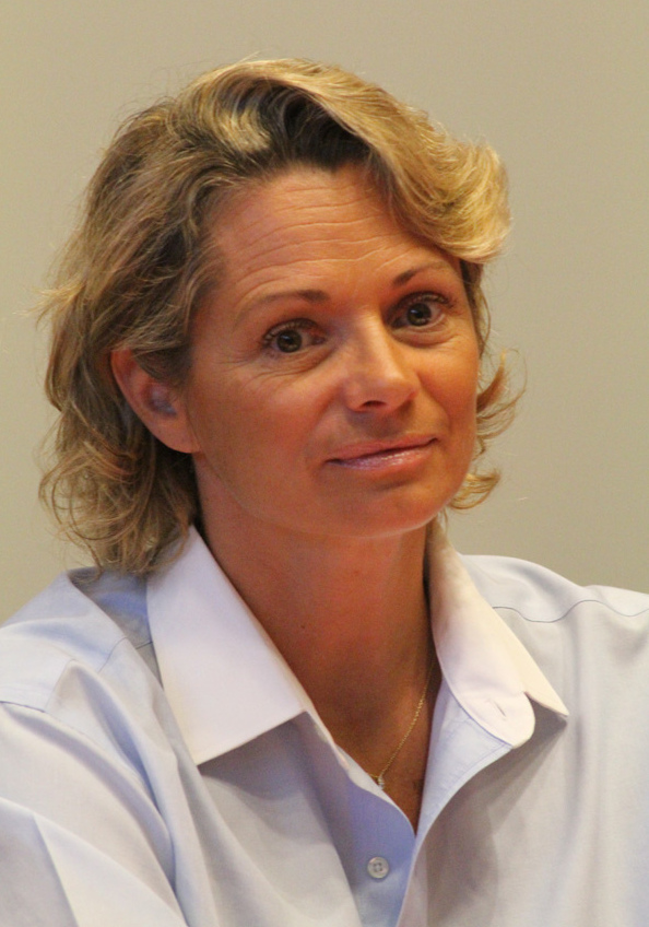 Muriel Hermine speaking at a press conference in 2014