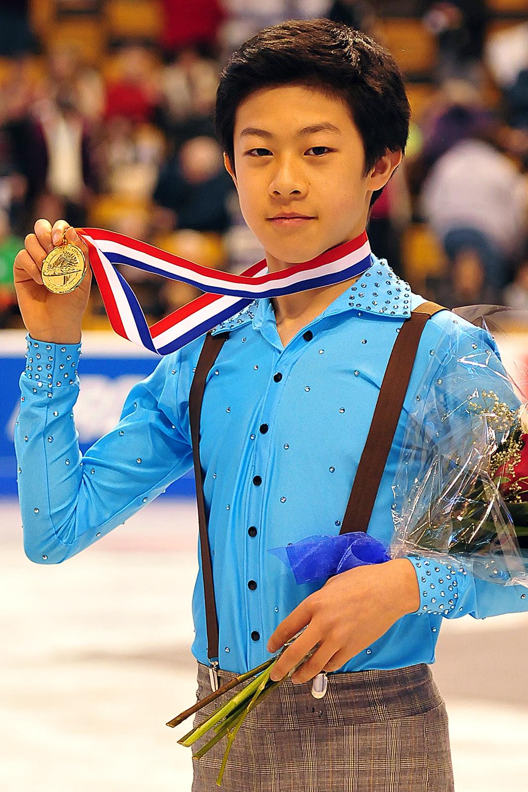Nathan Chen at the junior men's medal ceremony at the 2014 U.S. Figure Skating Championships