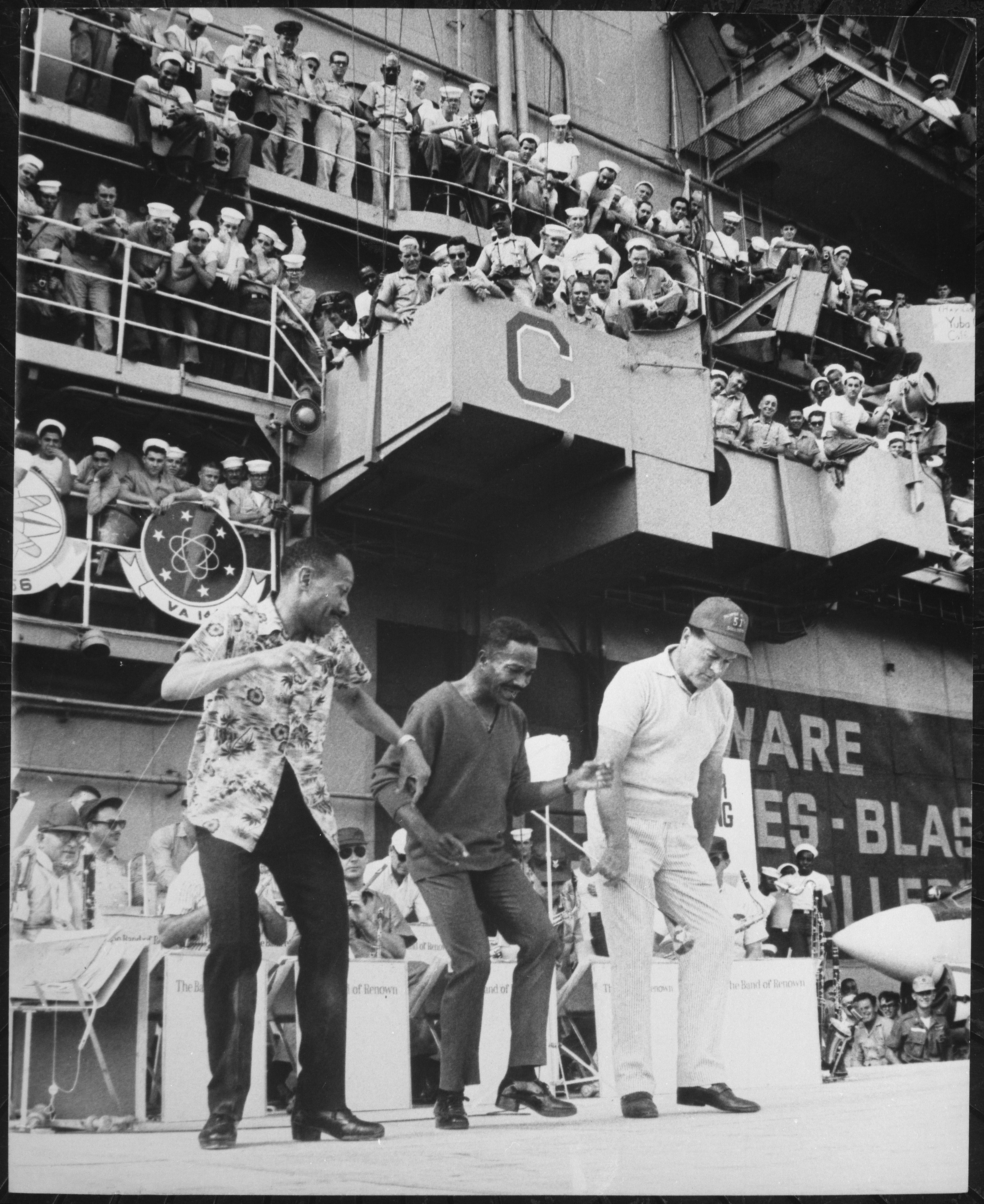 Bob Hope dancing with Fayard and Harold Nicholas aboard a United States aircraft carrier in 1965