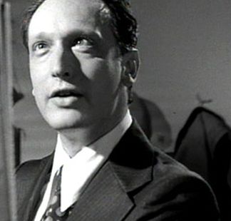 Paul Lazar in a still from the 1993 film The Debt