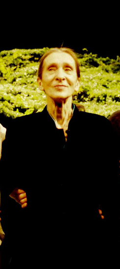 Portrait crop of Pina Bausch at the curtain call for Wiesenland in Paris in 2009