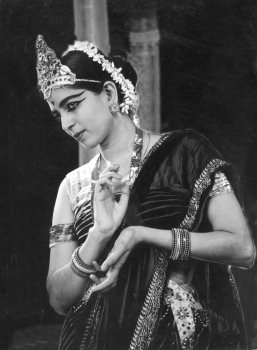 Black-and-white portrait of Rukmini Devi Arundale in dance costume and classical hand gesture, circa 1940