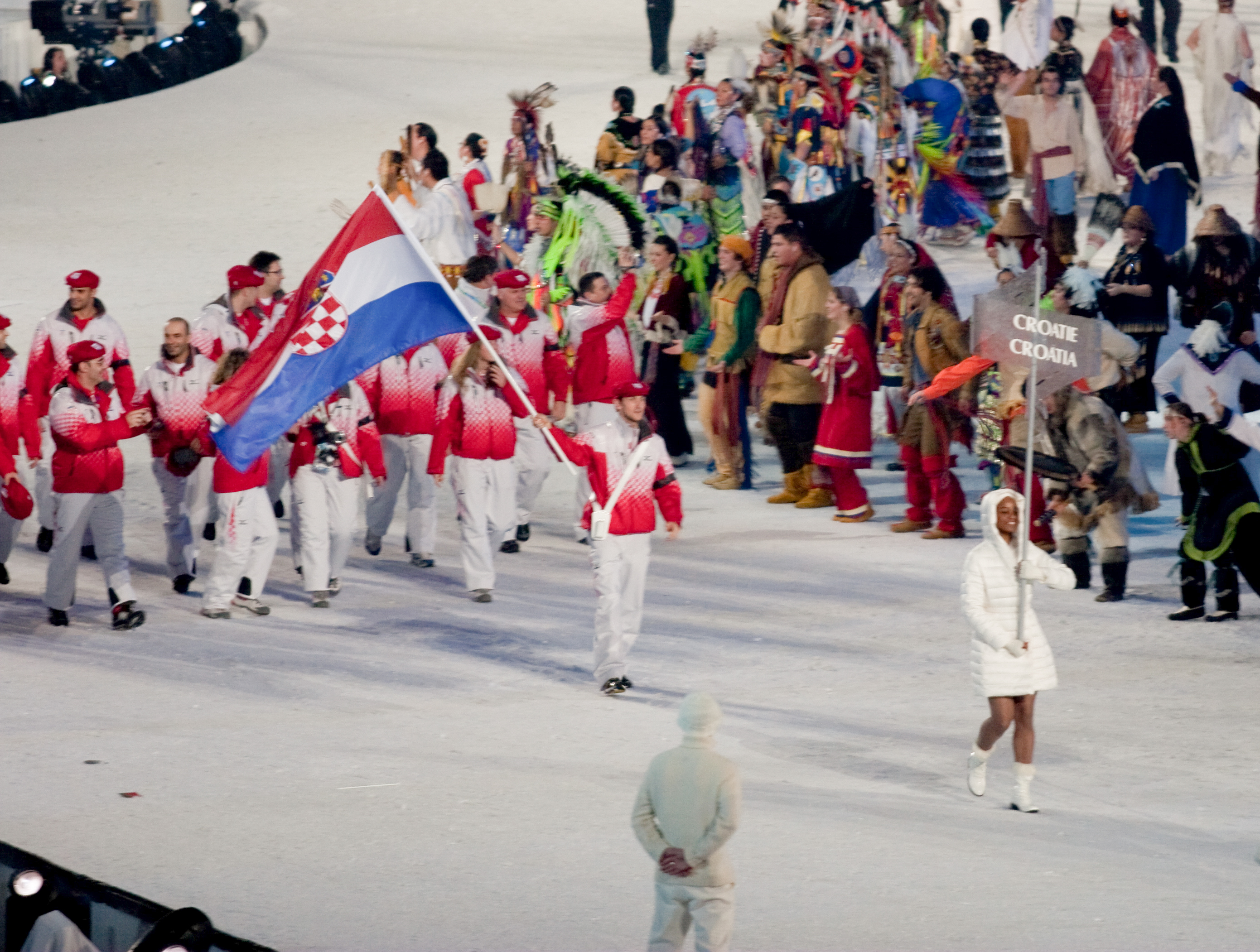 Croatian delegation entering the stadium during the 2010 Winter Olympic opening ceremony, led by placard bearer Sarah Louis-Jean