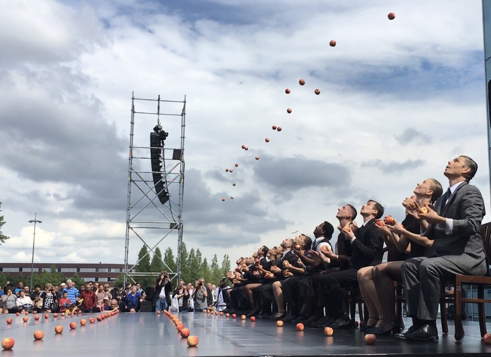 Sean Gandini and Kati Ylä-Hokkala nearest the camera during an outdoor performance of Smashed XL in 2016